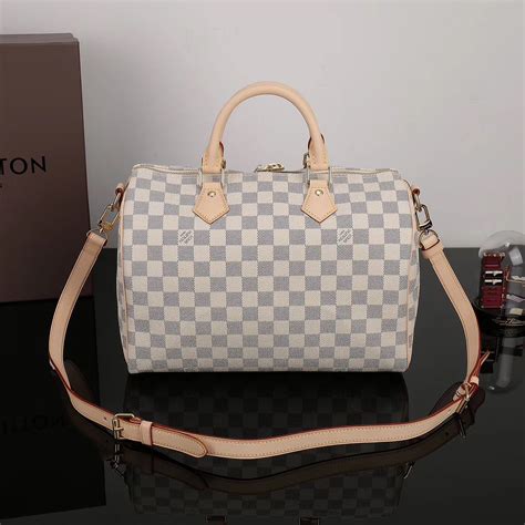 white louis vuitton hand bag